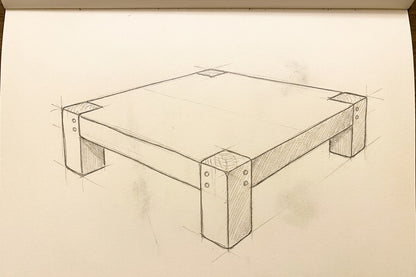 Croquis au crayon de la Table Basse ARBOR, dessiné à la main dans le carnet de l'atelier