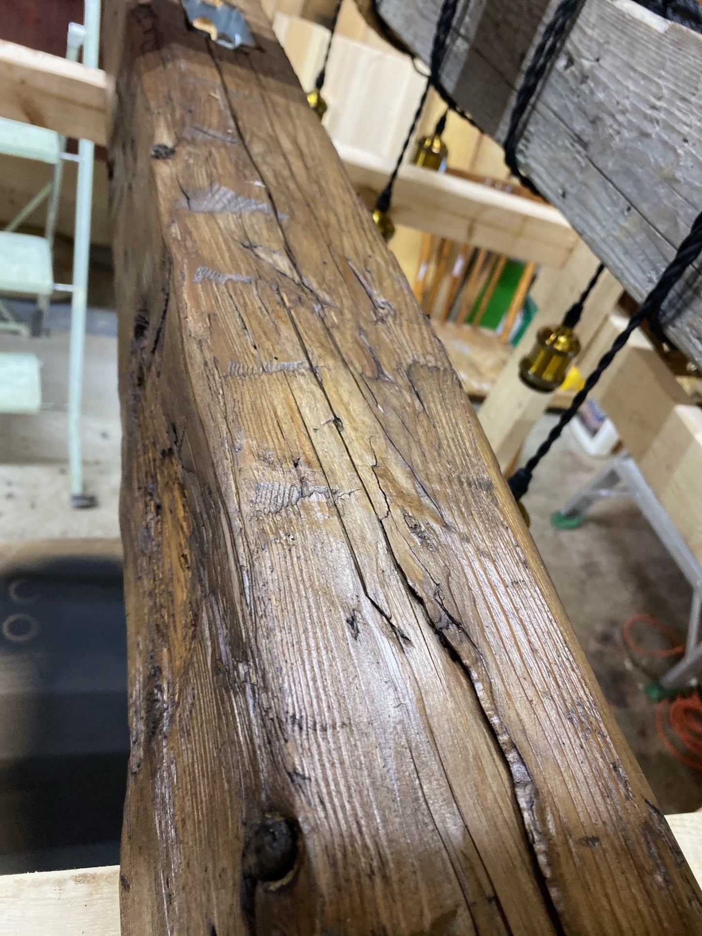 Custom made light fixture on 100-year-old barn wood from Quebec
