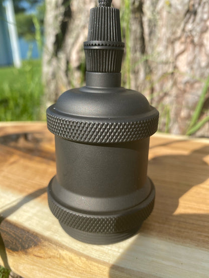 Custom made light fixture on 100-year-old barn wood from Quebec